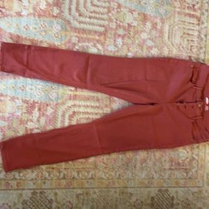 Rust color high rise button fly denim